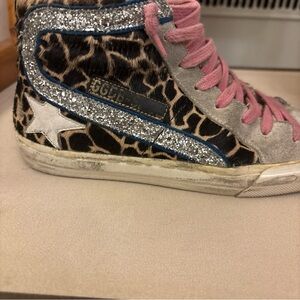 I am selling a pair of size 6 Golden Goose High Tops